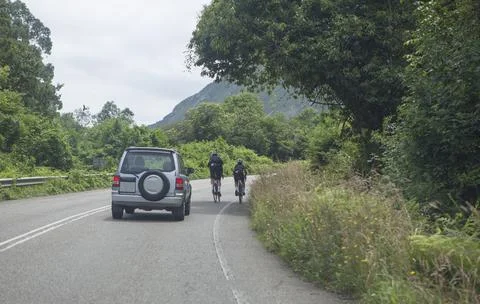 Cyclists parallel circulation on road Stockfoto's