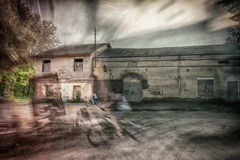 Cyclists in the parallel worlds 库存照片