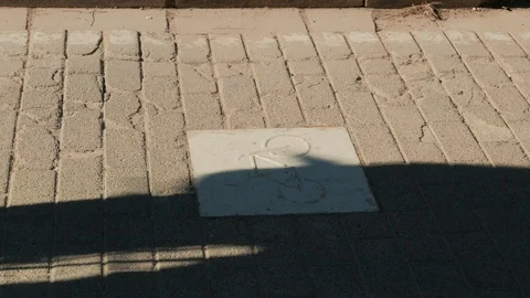 Cyclists pass quickly through the bike lane Stock Footage 102694598