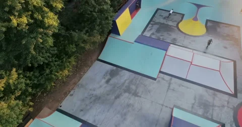 Cyclists perform tricks in skate park on the open air Video stock 103243025
