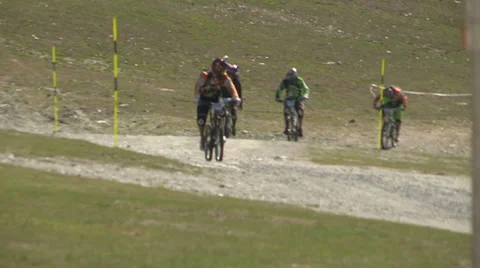 Cyclists racing In the mountains Stock Footage 33061457