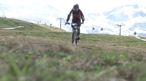 Cyclists racing In the mountains Stock Footage 33061469