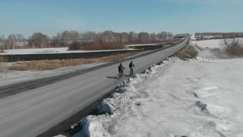 Cyclists ride on the road. 動画素材 151376321