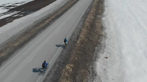 Cyclists ride on the road. 動画素材 151376337