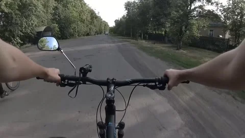Cyclists ride on the road on a summer evening Stockbeeldmateriaal 132819909