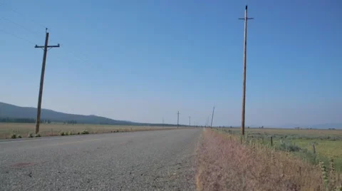 Cyclists riding bicycle on road Stock Footage 49099533