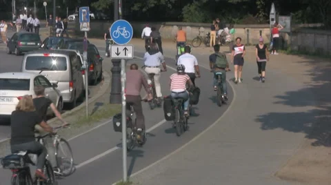 Cyclists riding in a cycle lane in central Berlin Stock Footage 42411862