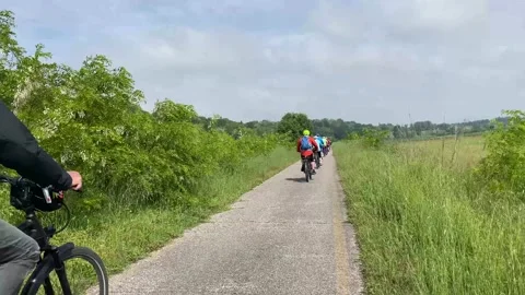 Cyclists Riding on a Dedicated Cycle Path, Pozzolo,5may2024, Pozollo, Italy Stock Footage 281251866