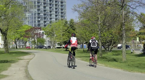 Cyclists riding in the Park. 4K UHD. Stock Footage 50585444