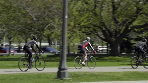 Cyclists riding in the Park. 4K UHD. Stock Footage 50587616