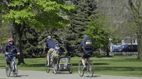 Cyclists riding in the Park. 4K UHD. Stock-Footage 50588748