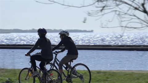 Cyclists riding in the Park. 4K UHD. Stock-Footage 50589830