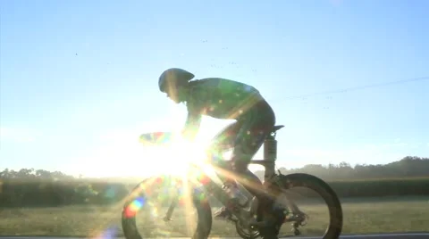 CYCLISTs RIDING AT SUNRISE Stock-Footage 51843804