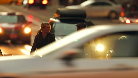 Cyclists talking on a city street. 库存影片 88405207