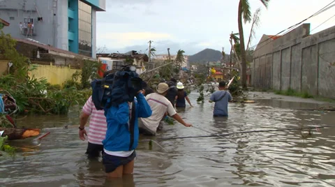 Cyclone aftermath flooded debris filled streets Video stock 33956962
