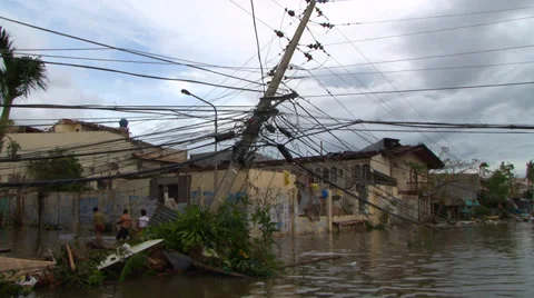 Cyclone aftermath flooded streets downed power poles Stock Footage 33957081