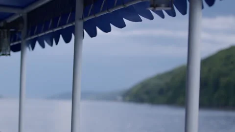 A cyclone is coming. The wind ruffles the soft roof in slow motion Video stock 260654457