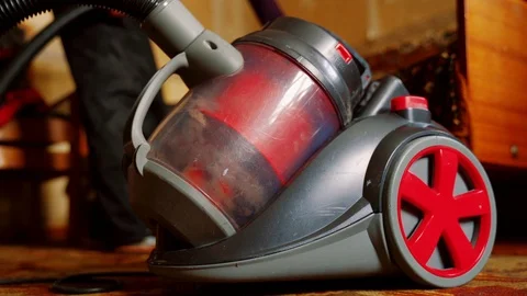 Cyclonic type vacuum cleaner with a transparent container. A lot of dust in the Stock Footage 123627213