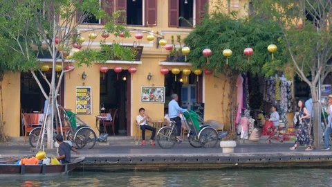 The cyclos in Hoi An old town Stock Footage 99165978