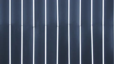 Cylinder Lights in a Dark Studio Stock Footage 208763535