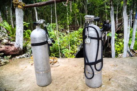 Cylinders for diving in the forest. Cave diving. Mexico Stock Photos