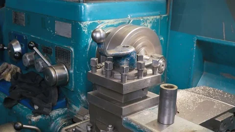 Cylindrical boring of connecting rod piston pin bushing on old shabby blue lathe Stock-Footage 81516867