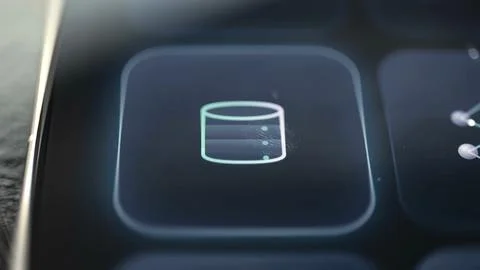 Cylindrical database icon selected on a modern technology investment dashboard Stock Photos