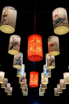 A cylindrical lantern with auspicious blessings written on it during the Be.. Stock Photos