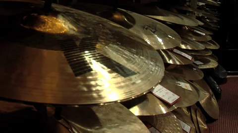 Cymbals at a music store Stock Footage 34597883