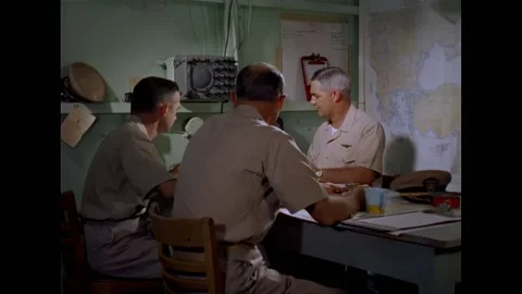 CYPRUS - 1960 - Three officers work in the USS Essex combat information center Stock Footage 337710057