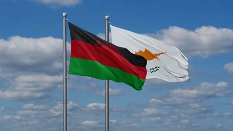 Cyprus and Malawi flags Stock Footage 287947979