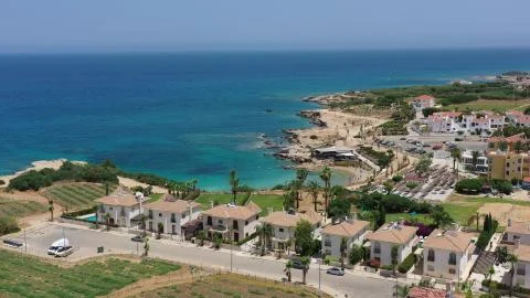 Cyprus coast with cliffs and beach aerial view Stock Photos