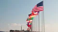 Cyprus coastline with lighthouse on rock and national flags HD Footage