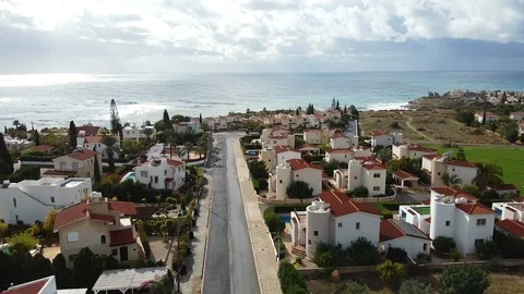 Cyprus, flight over a small town by the sea. Small cottages and deserted streets Stock Footage 124648218