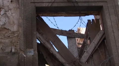 Cyprus Green Line UN buffer zone - derelict doorway ruins and wire Stock Footage 61380148