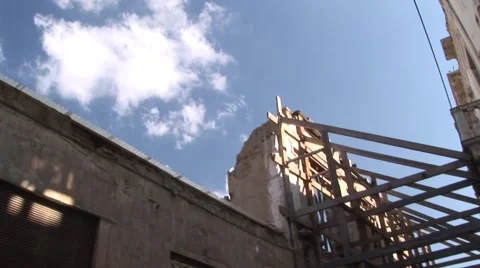 Cyprus Green Line UN buffer zone - tilt down from destroyed facade Stock Footage 61380189