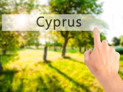 Cyprus - Hand pressing a button on blurred background concept on visual scree Stock Photos