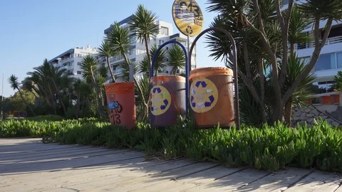 CYPRUS, LARNACA - CIRCA May 2019: Garbage containers on street 스톡 동영상 109239284