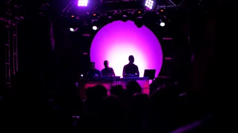 Cyprus, Larnaca, September 15, 2019. Full moon party. Silhouettes of a crowd Stock Footage 134612313