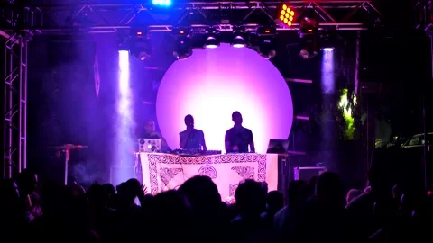 Cyprus, Larnaca, September 15, 2019. Full moon party. Silhouettes of a crowd Stock Footage 134639574