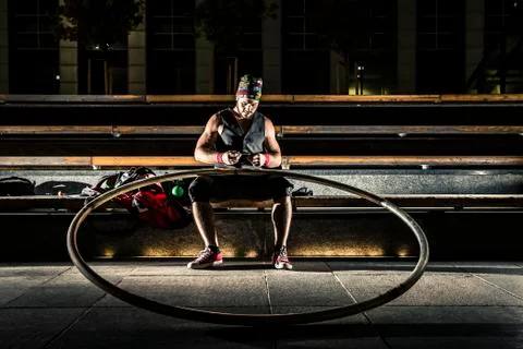 Cyr wheel performance session at night in Riga. Photos