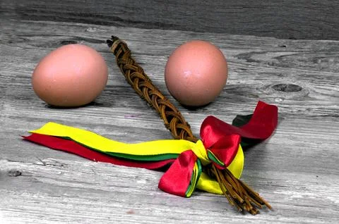 Czech Easter lilies with brown eggs on wooden table Stock Photos