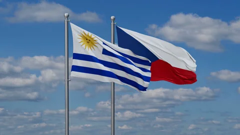 Czech Republic and Uruguay two flags Stock Footage 283478703
