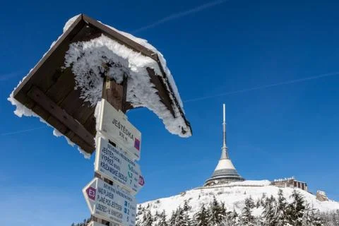 Czech Republic - Liberec - transmitter Jested in winter with signpost Stock Photos