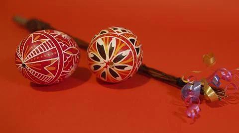 Czech rod with differently colored Easter eggs, red background 스톡 사진