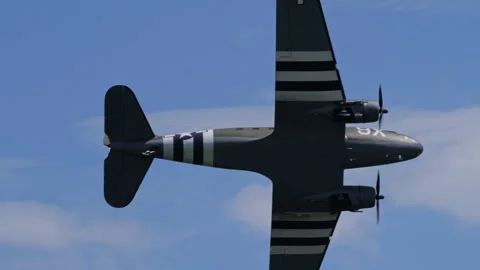 D-Day Striped Douglas C-47 Skytrain Warbird Aerial Display in Swiss Mountains Stock Footage 328339477