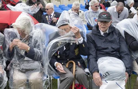 D-day Veteran Battle With The Elements While Attending A Commemoration Service F Stock Photos