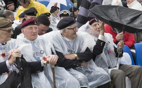 D-day Veteran Battle With The Elements While Attending A Commemoration Service F Stock Photos