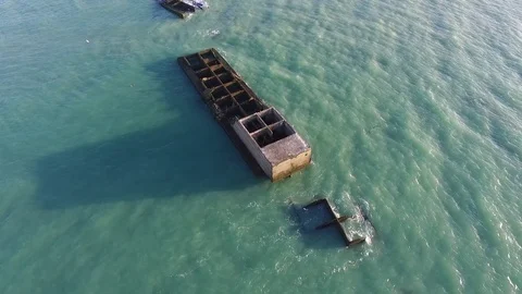D-Day World War 2 Boat Wreckages- Arromanches, France Stock Footage 85639319