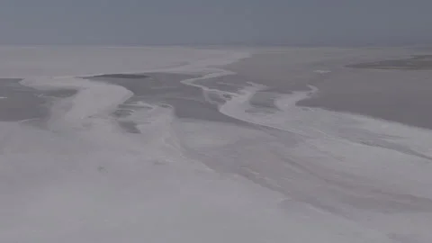 D-Log M. Aksaray, Turkey. Tuz Golu salt plain, vast white expanse with subtle Stock Footage 339765318